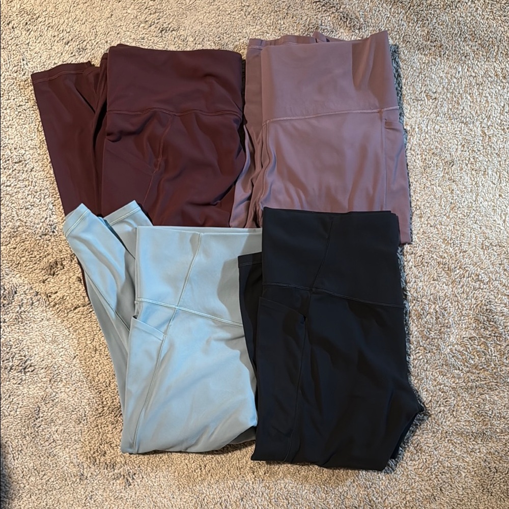Set of Four Athleta Salutation Stash Leggings in Assorted Colors